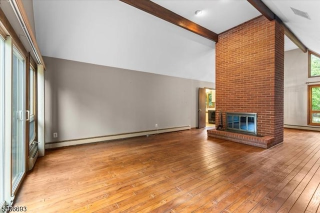 31 Casper Berger Rd, Readington Twp, NJ 08889 - unfurnished living room with beam ceiling, baseboard heating, hardwood / wood-style flooring, a fireplace, and high vaulted ceiling