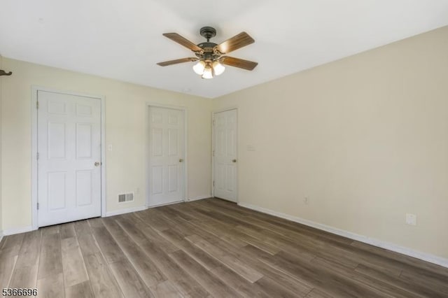 2909 Lindsley Rd, Bridgewater Twp, NJ 08807 - unfurnished bedroom featuring wood finished floors and a ceiling fan