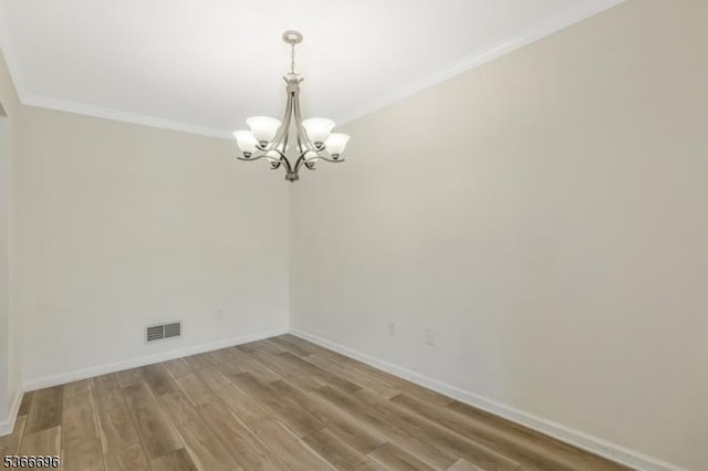 2909 Lindsley Rd, Bridgewater Twp, NJ 08807 - spare room with a chandelier, crown molding, and light wood finished floors