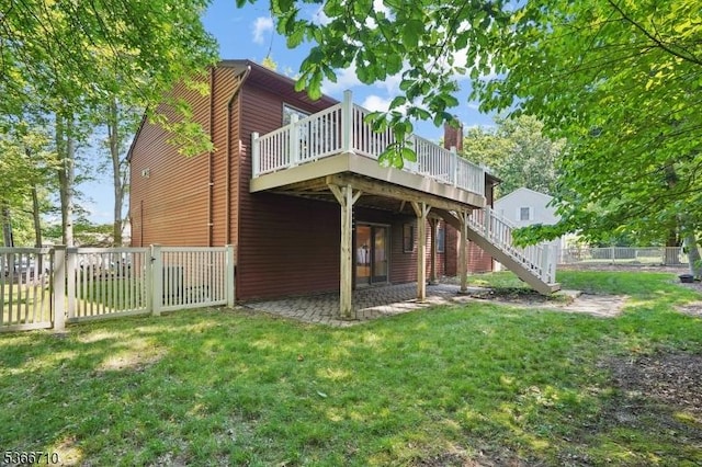 15 Woglum Pl, Berkeley Heights Twp, NJ 07922 - back of property with a wooden deck, a fenced backyard, a patio area, and stairs