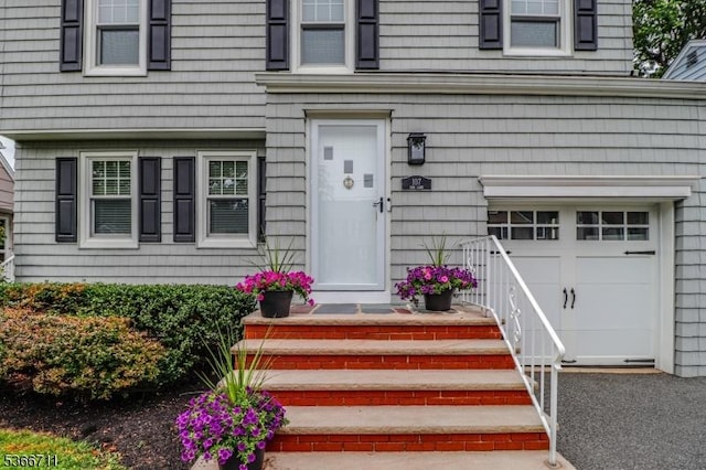 107 Oak Ln, Cranford Twp, NJ 07016 - property entrance featuring an attached garage