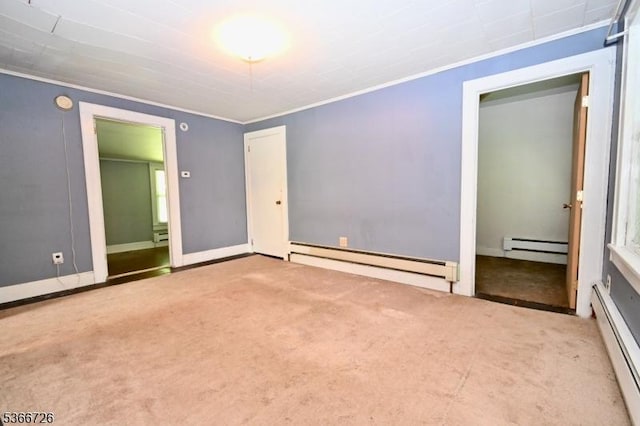 55 Taylor Rd, Jefferson Twp, NJ 07885 - unfurnished bedroom featuring baseboard heating, a baseboard radiator, crown molding, and carpet floors