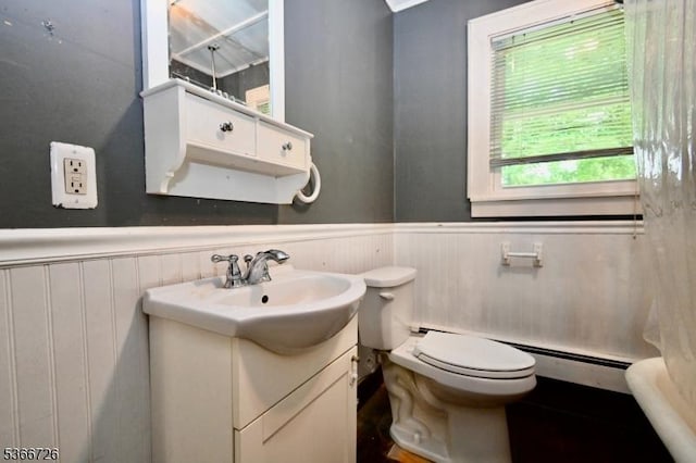 55 Taylor Rd, Jefferson Twp, NJ 07885 - bathroom featuring a baseboard heating unit, wainscoting, vanity, and a shower