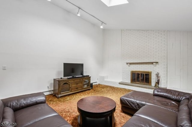 4 Dickens Ct, Morris Twp, NJ 07960 - living room featuring rail lighting, a skylight, and a brick fireplace