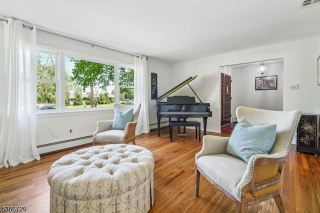 4 Dickens Ct, Morris Twp, NJ 07960 - living area with baseboard heating and wood finished floors