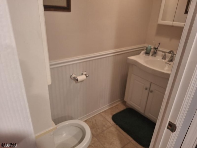21 Fagan Pl, Woodbridge Twp, NJ 07067 - bathroom with vanity, tile patterned floors, and a wainscoted wall