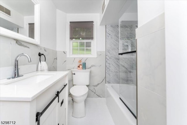 608 Duquesne Ter, Union Twp, NJ 07083 - full bath with tile walls, vanity, tub / shower combination, and a wainscoted wall