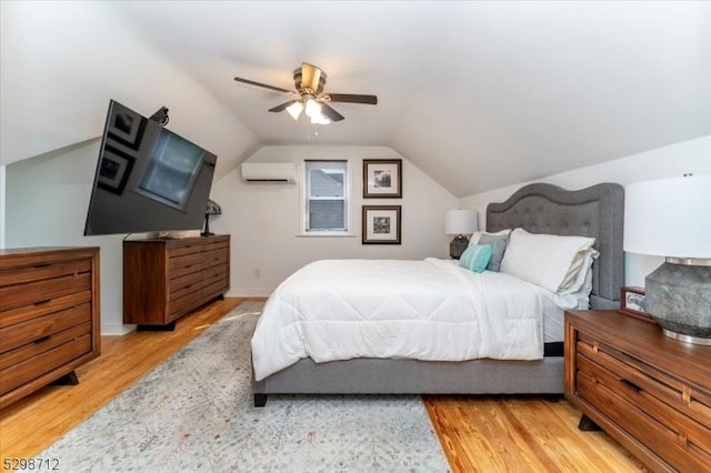 608 Duquesne Ter, Union Twp, NJ 07083 - bedroom featuring a wall unit AC, light wood-style floors, lofted ceiling, and a ceiling fan