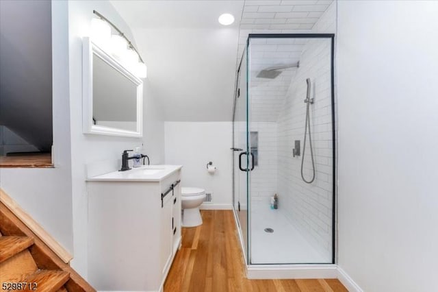 608 Duquesne Ter, Union Twp, NJ 07083 - bathroom with vanity, a stall shower, and wood finished floors