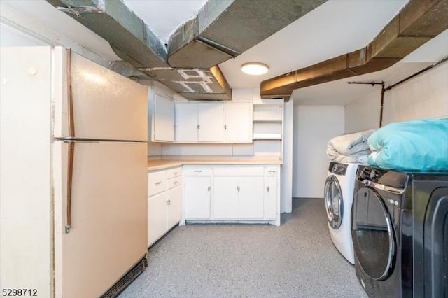 608 Duquesne Ter, Union Twp, NJ 07083 - laundry room with washing machine and dryer and cabinet space