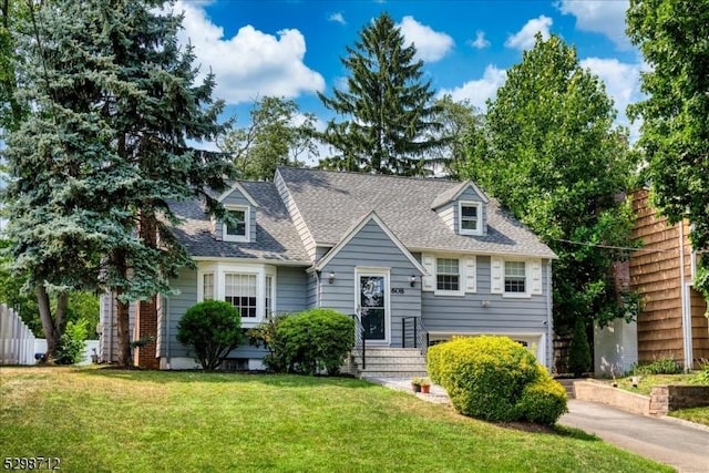 608 Duquesne Ter, Union Twp, NJ 07083 - cape cod house with a shingled roof and a garage