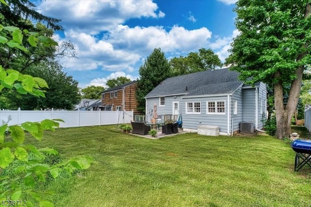 608 Duquesne Ter, Union Twp, NJ 07083 - back of property with outdoor lounge area, a patio, and a shingled roof