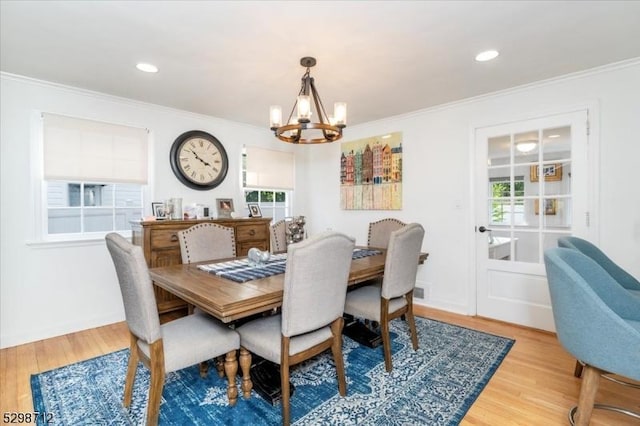 608 Duquesne Ter, Union Twp, NJ 07083 - dining area featuring a chandelier, healthy amount of natural light, wood finished floors, crown molding, and recessed lighting