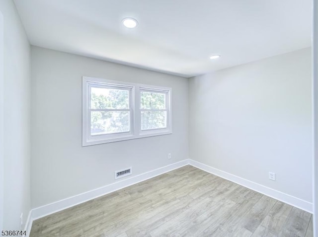 44 Sullivan Way E, Brunswick Twp, NJ 08816 - empty room featuring wood finished floors and recessed lighting
