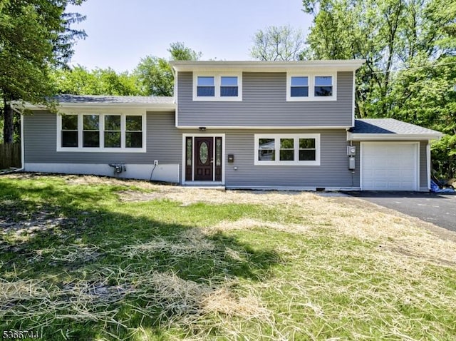 44 Sullivan Way E, Brunswick Twp, NJ 08816 - split level home featuring a garage, driveway, and a front lawn