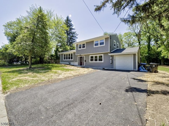 44 Sullivan Way E, Brunswick Twp, NJ 08816 - view of front of home featuring driveway, a garage, and a front yard