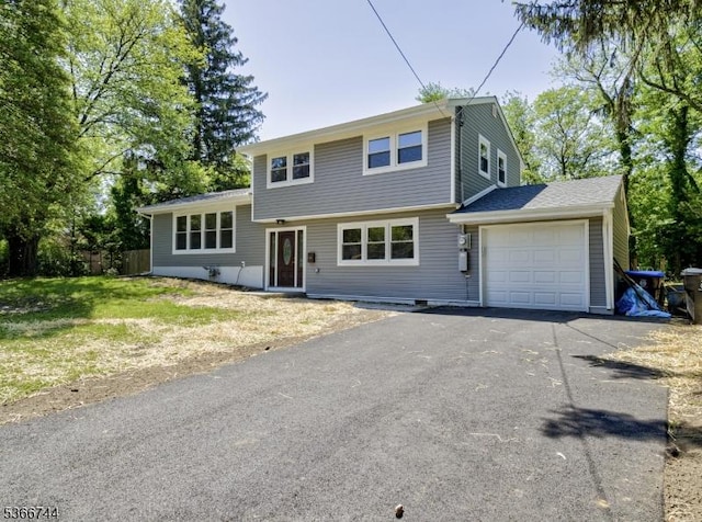 44 Sullivan Way E, Brunswick Twp, NJ 08816 - split level home with a garage and driveway