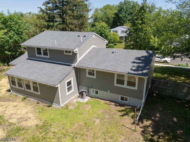44 Sullivan Way E, Brunswick Twp, NJ 08816 - rear view of property featuring roof with shingles