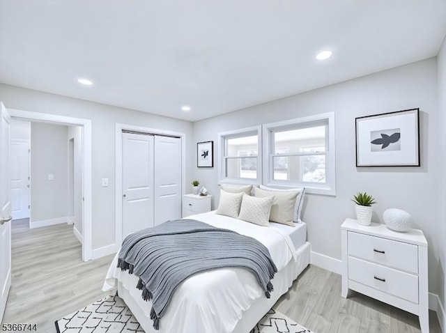 44 Sullivan Way E, Brunswick Twp, NJ 08816 - bedroom with light wood-style floors, a closet, and recessed lighting