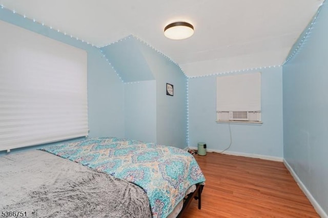139 Churchill Ave, Franklin Twp, NJ 08873 - bedroom with wood finished floors, lofted ceiling, and cooling unit