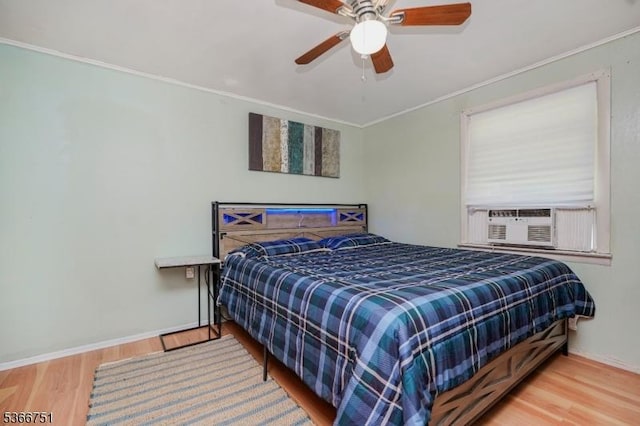 139 Churchill Ave, Franklin Twp, NJ 08873 - bedroom featuring wood finished floors, crown molding, cooling unit, and a ceiling fan