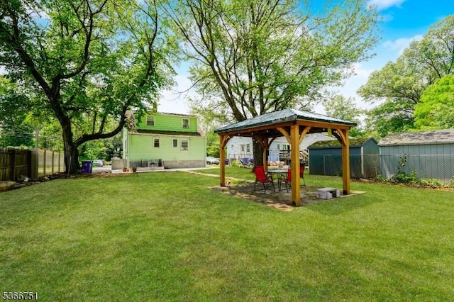 139 Churchill Ave, Franklin Twp, NJ 08873 - fenced backyard featuring a gazebo and a patio area