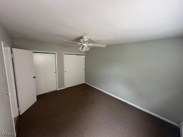 48-50 Elm St Unit B1, Morristown Town, NJ 07960 - unfurnished bedroom with multiple closets, ceiling fan, and dark colored carpet