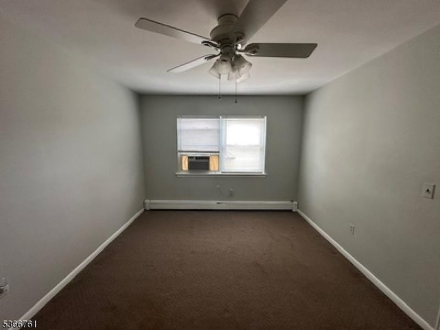 48-50 Elm St Unit B1, Morristown Town, NJ 07960 - spare room with baseboard heating, a ceiling fan, dark colored carpet, and cooling unit