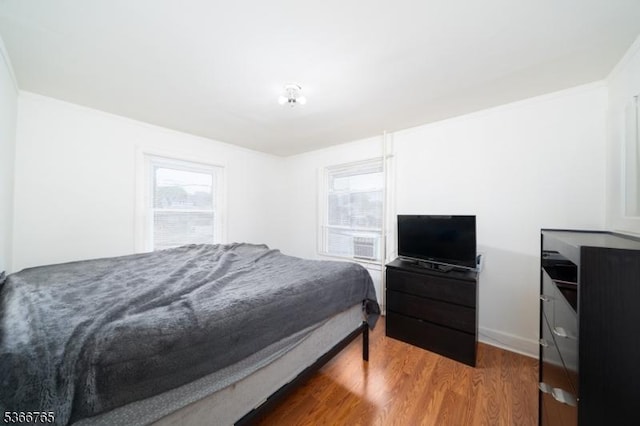 129 Ball St, Irvington Twp, NJ 07111 - bedroom featuring wood finished floors and cooling unit
