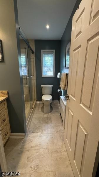 53 Sandra Cir Unit 4, Westfield Town, NJ 07090 - bathroom featuring vanity and a stall shower