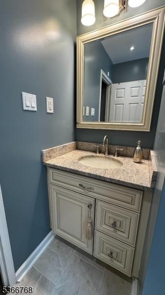 53 Sandra Cir Unit 4, Westfield Town, NJ 07090 - bathroom featuring vanity and baseboards