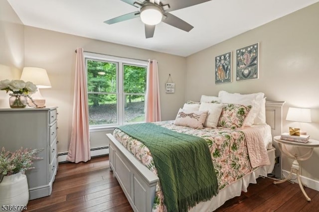 159 Kings Hwy, Washington Twp, NJ 07853 - bedroom with dark wood-style floors, a baseboard radiator, and ceiling fan