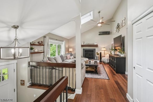 159 Kings Hwy, Washington Twp, NJ 07853 - living room with ceiling fan, vaulted ceiling, wood finished floors, and a glass covered fireplace