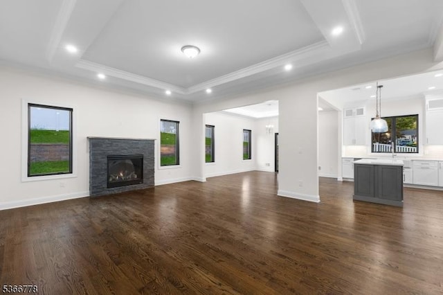 150 Parsippany Blvd, Parsippany-Troy Hills Twp, NJ 07005 - unfurnished living room with plenty of natural light, ornamental molding, recessed lighting, dark wood-style flooring, and a fireplace