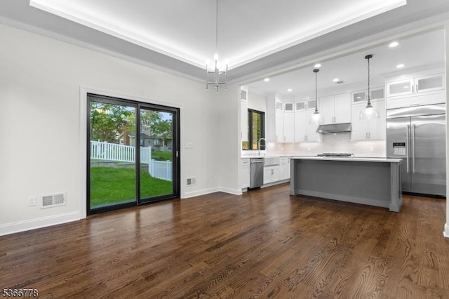 150 Parsippany Blvd, Parsippany-Troy Hills Twp, NJ 07005 - kitchen with stainless steel appliances, under cabinet range hood, light countertops, white cabinets, and decorative backsplash