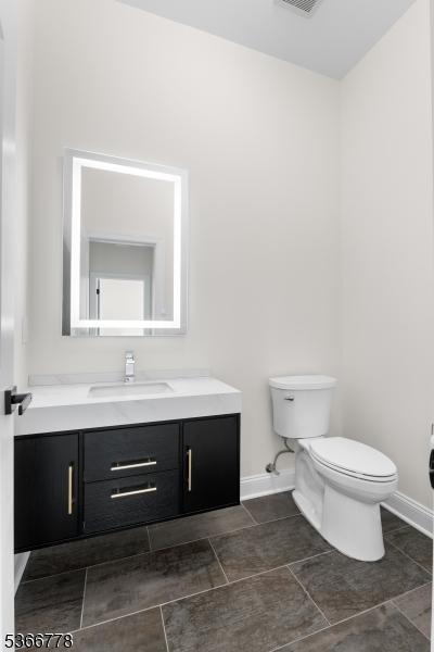 150 Parsippany Blvd, Parsippany-Troy Hills Twp, NJ 07005 - bathroom with toilet and vanity