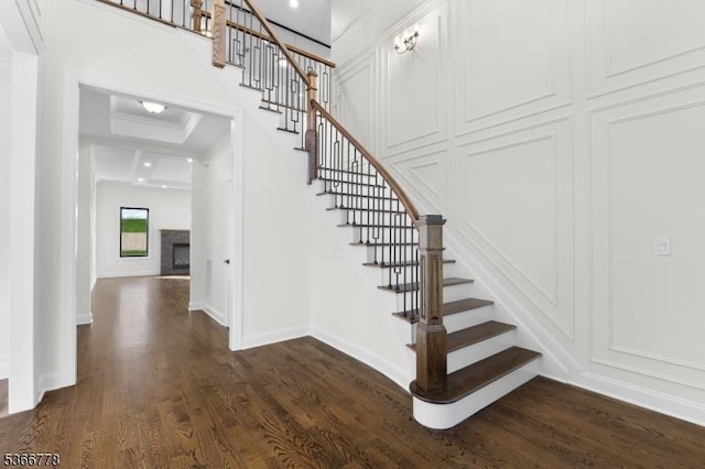 150 Parsippany Blvd, Parsippany-Troy Hills Twp, NJ 07005 - staircase with wood finished floors and a fireplace