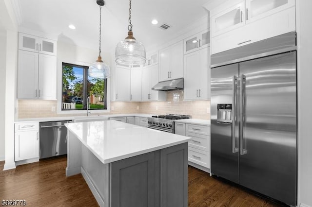 150 Parsippany Blvd, Parsippany-Troy Hills Twp, NJ 07005 - kitchen featuring premium appliances, under cabinet range hood, recessed lighting, light countertops, and tasteful backsplash