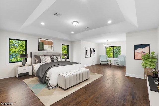 150 Parsippany Blvd, Parsippany-Troy Hills Twp, NJ 07005 - bedroom featuring a tray ceiling, multiple windows, dark wood-style flooring, a chandelier, and recessed lighting
