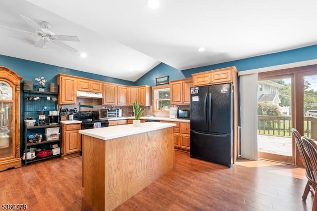 25 Alabama Ave, Jefferson Twp, NJ 07849 - kitchen with black appliances, light countertops, tasteful backsplash, vaulted ceiling, and healthy amount of natural light
