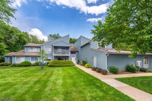95 Drake Ln, Roxbury Twp, NJ 07852 - view of front of house with a balcony and a front lawn