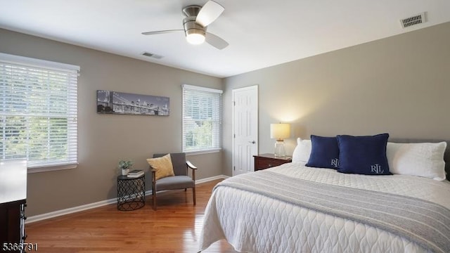 31 Burniston Ct, Hillsborough Twp, NJ 08844 - bedroom featuring wood finished floors, multiple windows, and a ceiling fan