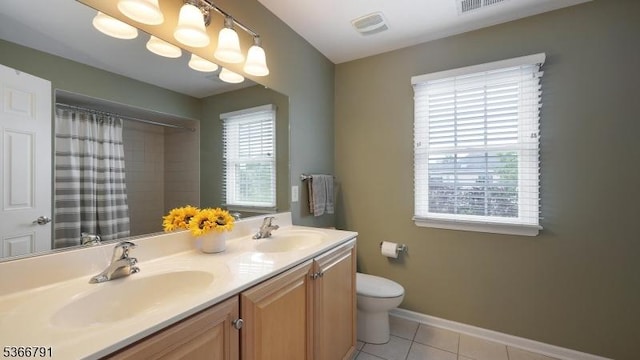 31 Burniston Ct, Hillsborough Twp, NJ 08844 - full bathroom with tile patterned floors, double vanity, and curtained shower