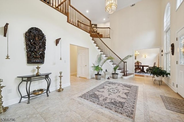 17 N Ridge Rd, Denville Twp, NJ 07834 - foyer entrance featuring a towering ceiling, a chandelier, stairway, recessed lighting, and marble finish flooring