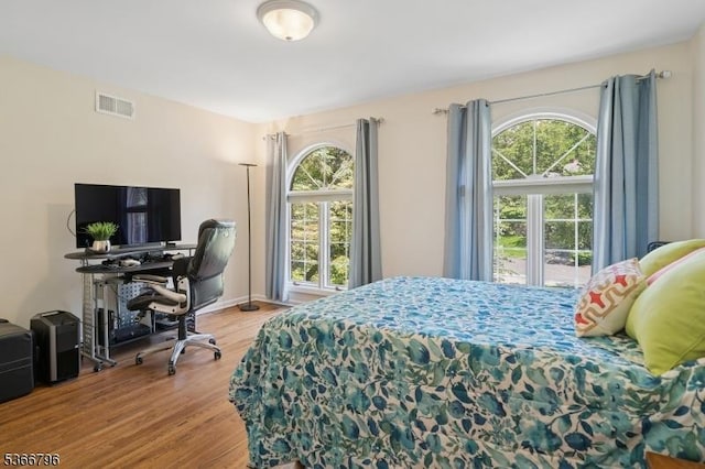 17 N Ridge Rd, Denville Twp, NJ 07834 - bedroom featuring multiple windows, wood finished floors, and a desk