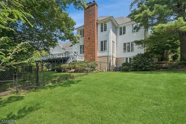 17 N Ridge Rd, Denville Twp, NJ 07834 - back of house with a chimney and a wooden deck