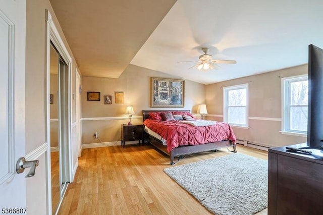 4 Panorama Dr, Vernon Twp, NJ 07461 - bedroom with light wood-style floors, baseboard heating, a ceiling fan, and lofted ceiling