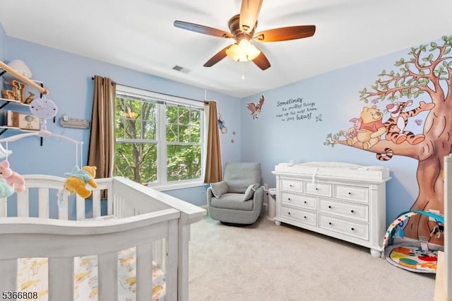 6 Elston Ct, Wanaque Boro, NJ 07420 - bedroom featuring light colored carpet, a crib, and ceiling fan