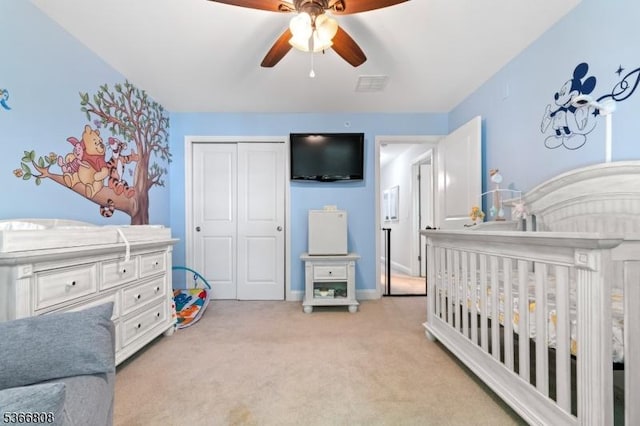 6 Elston Ct, Wanaque Boro, NJ 07420 - bedroom with light carpet, a closet, a crib, and ceiling fan