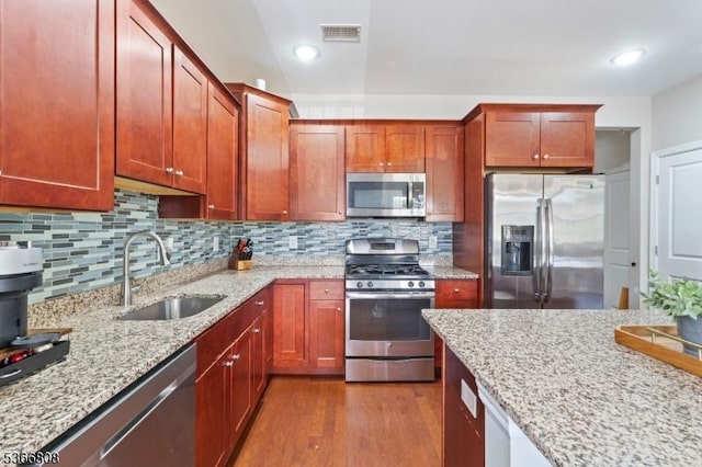6 Elston Ct, Wanaque Boro, NJ 07420 - kitchen with appliances with stainless steel finishes, dark wood finished floors, light stone countertops, and recessed lighting